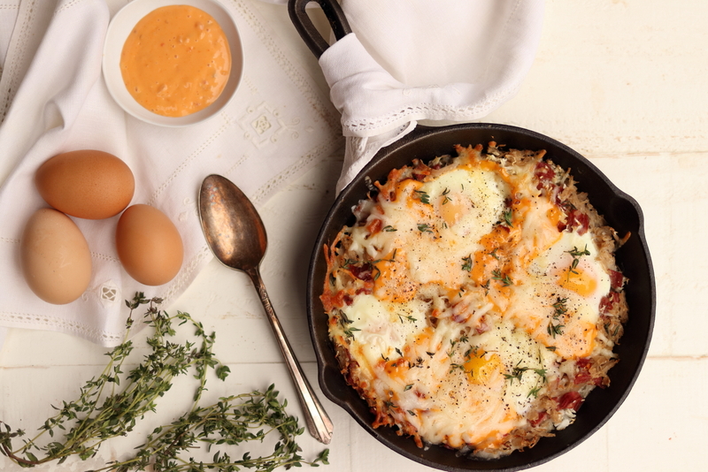 Baked Eggs with Corned Beef and Sauerkraut Hash
