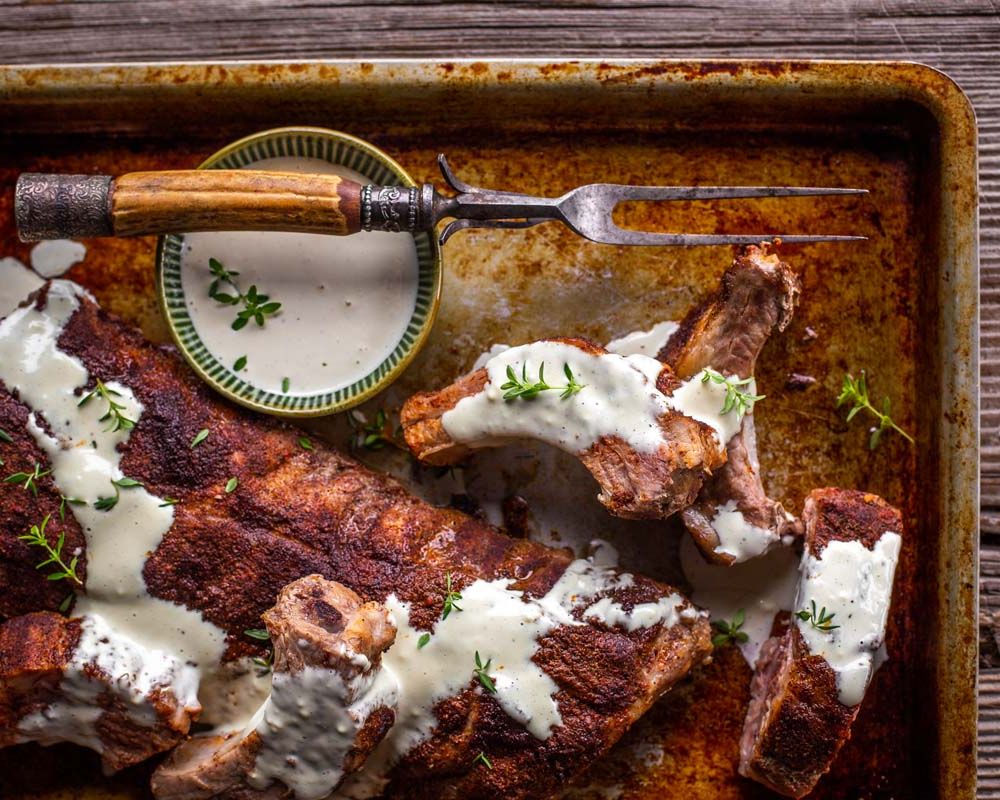 The BEST Baby Back Ribs with White BBQ Sauce